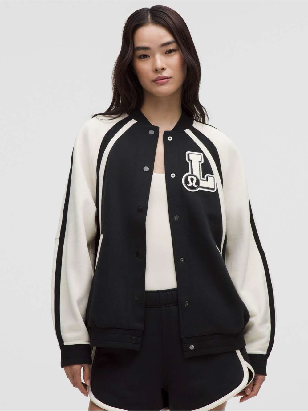 Lululemon Scuba Oversized Collegiate Jacket *Graphic in Black / Light Ivory XS/S